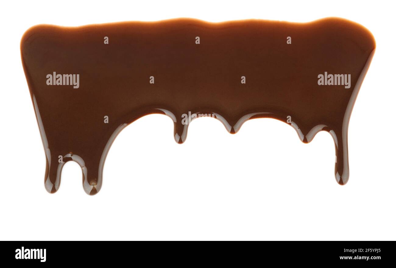 Pattern of melted chocolate pouring and dripping on white background Stock Photo