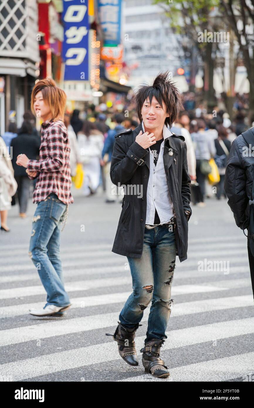 Japanese male hosts touting for business on the streets of Shinjuku, Tokyo, Japan Stock Photo