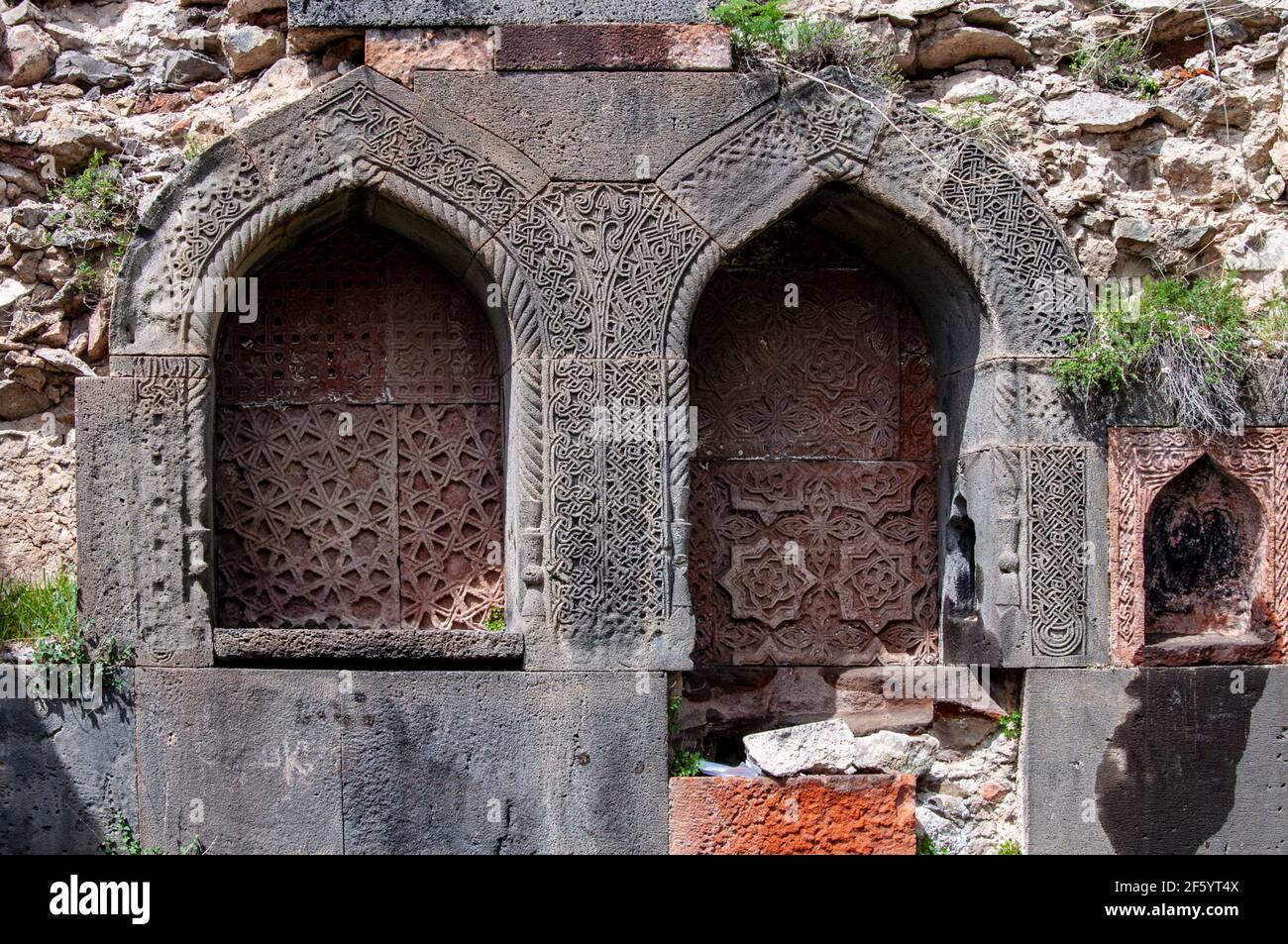 Beautiful traditional Armenian ornaments decorating  walls at the Havuts Tar monastery complex in Armenia Stock Photo
