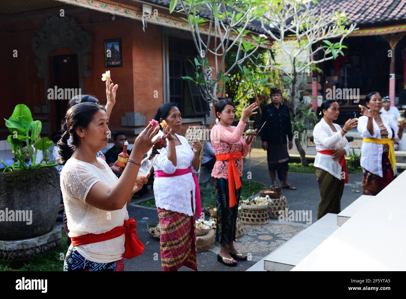 A Pre marriage blessing ceremony in a small Hindu temple in Ubud, Bali
