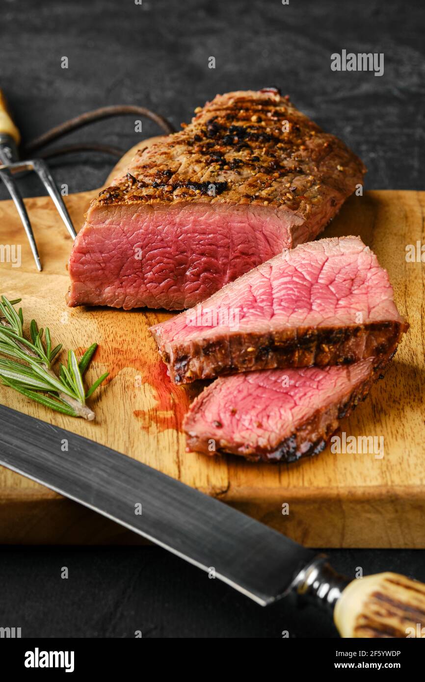 Beef steak medium rare with slices Stock Photo