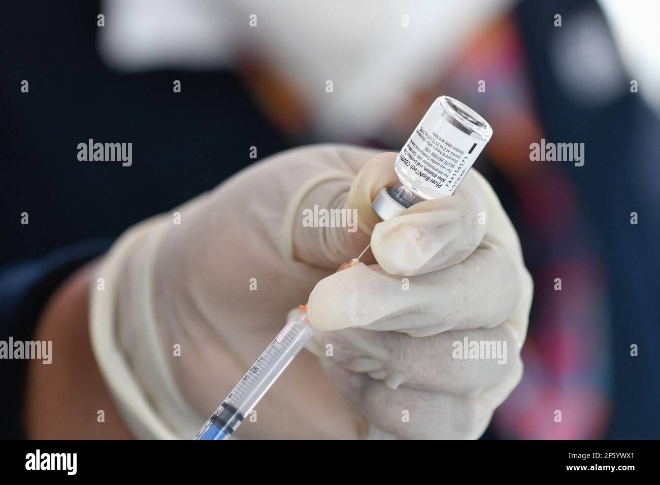 A nurse prepares a dose of Covid-19 Pfizer-BioNTech during a mass vaccination program to immunize Elderlies more that 60 years of age at Toluca Technological Institute. Toluca, Mexico, March 26, 2021. Mexico has published revised figures indicating that the number of deaths caused by coronavirus is 60 % higher than previously reported. More than 321,000 people are now believed to have died from Covid-19 in the country. The revised toll places Mexico with the second highest number of Covid-related deaths in the world, after the US. Photo by Amaresh V. Narro/Eyepix/ABACAPRESS.COM Stock Photo