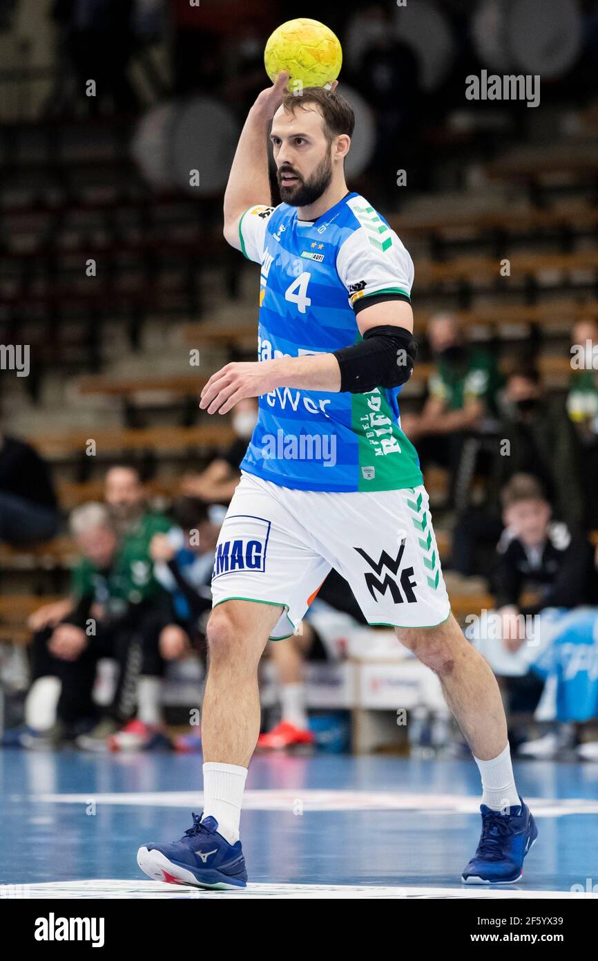 25 March 2021, Baden-Wuerttemberg, Göppingen: Handball: Bundesliga, Frisch  Auf Göppingen - GWD Minden, Matchday 16 at the EWS Arena.Göppingen's Tim  Kneule in action. Photo: Tom Weller/dpa Stock Photo - Alamy