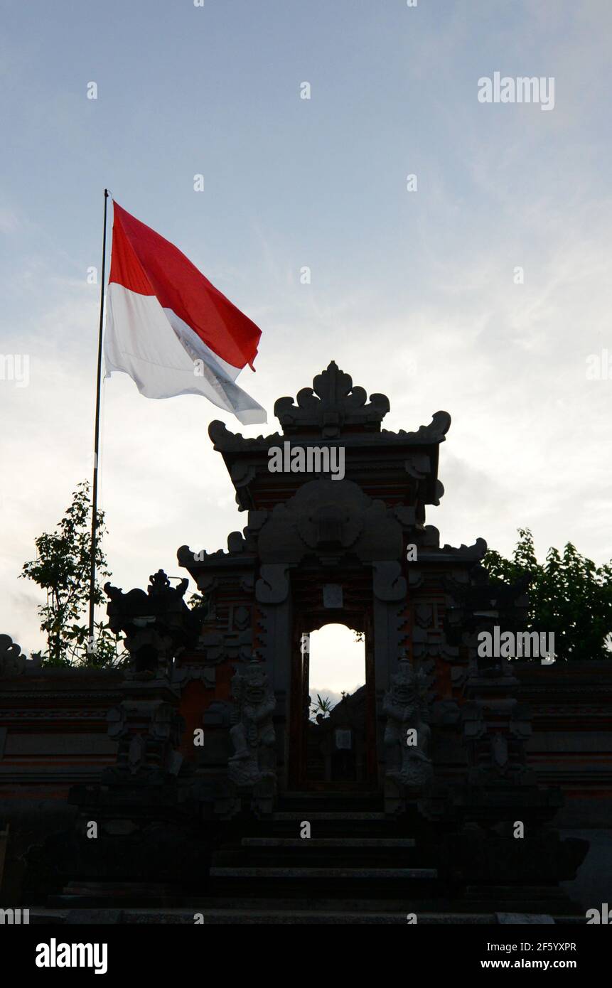An Indonesian flag by the entrance of a Hindu temple in Ubud, Bali