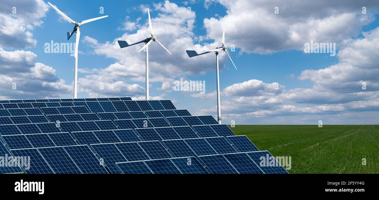 Solar panels and wind turbines on a green field. Sustainable energy ...