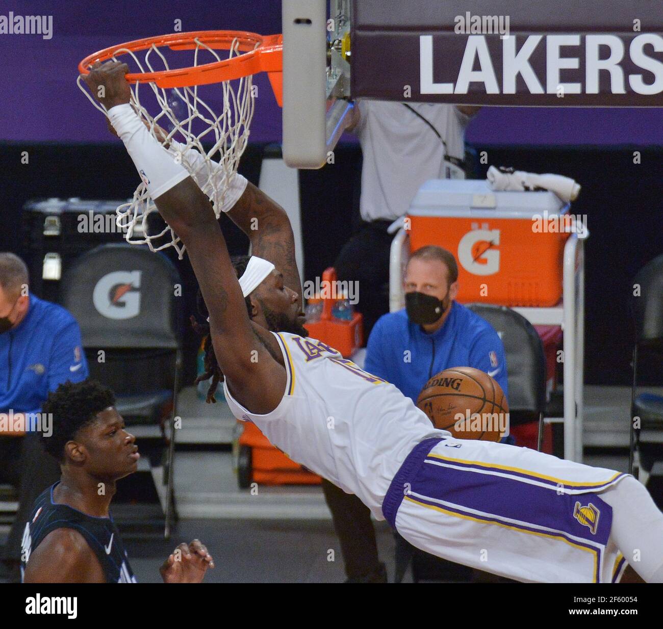 Los Angeles, United States. 29th Mar, 2021. Los Angeles Lakers' center Montrezl Harrell jams for two points against the Orlando Magic during the first half at Staples Center in Los Angeles on Sunday, March 28, 2021. The Lakers defeated the Magic 96-93. Photo by Jim Ruymen/UPI Credit: UPI/Alamy Live News Stock Photo