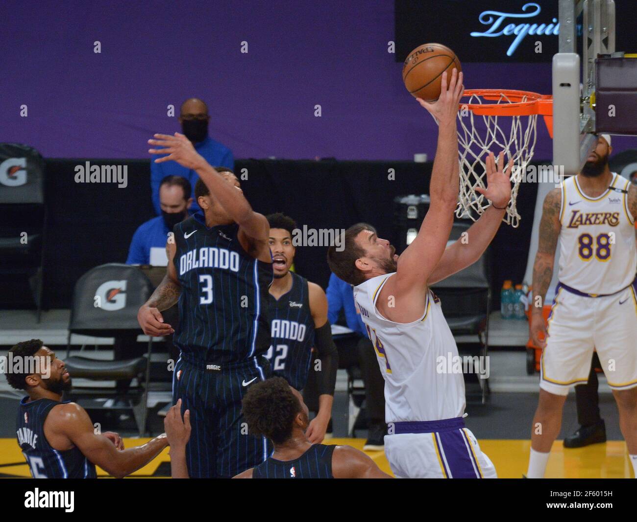 Los Angeles, United States. 29th Mar, 2021. Los Angeles Lakers' center Marc Gasol scores on Orlando Magic defenders during the first half at Staples Center in Los Angeles on Sunday, March 28, 2021. The Lakers defeated the Magic 96-93. Photo by Jim Ruymen/UPI Credit: UPI/Alamy Live News Stock Photo