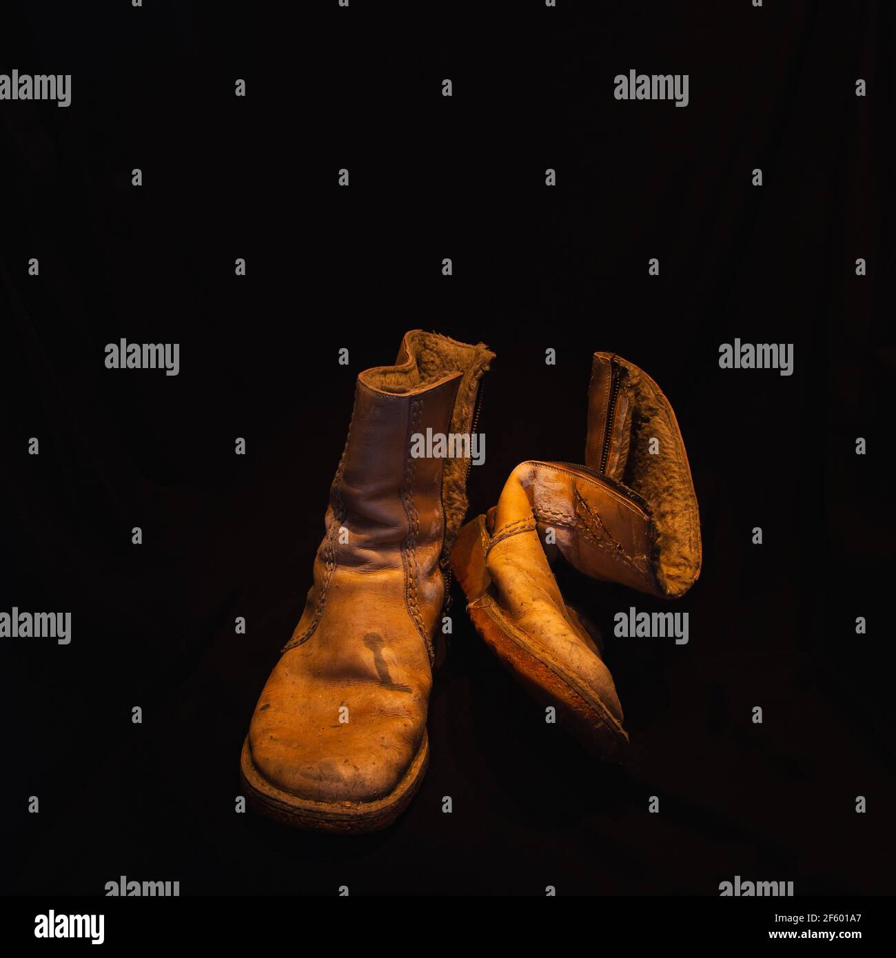 Schoes, old shoes, boots, retro style photo, close up view, still life, Nahaufnahme, Detailaufnahme, detail shot, studio shot, studioaufnahme, marode Stock Photo