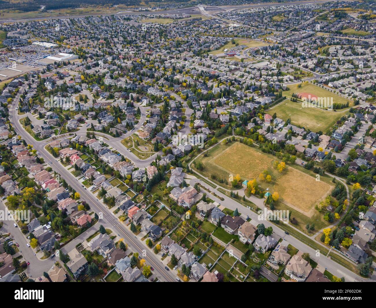 Aerial view of houses and streets in residential neighbourhood during fall season in Calgary, Alberta, Canada. Stock Photo