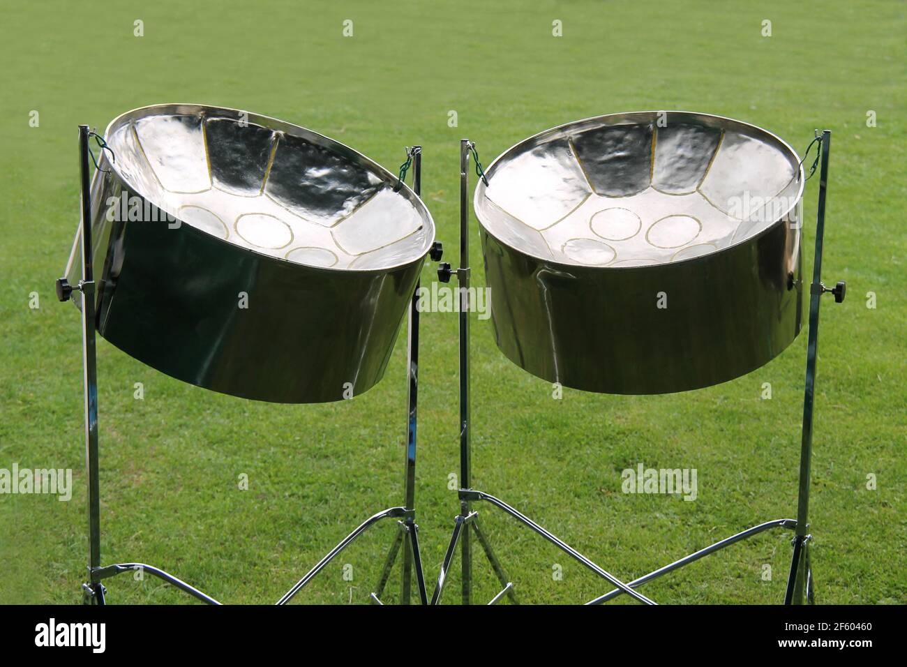 A Pair of Musical Metal Steel Drums on Stands Stock Photo Alamy