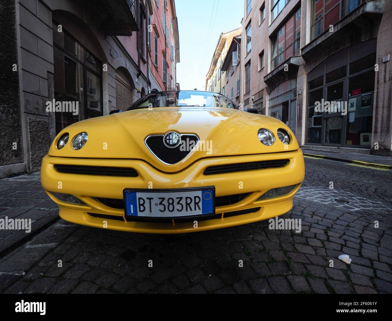 yellow Alfa Romeo Spider GTV cabriolet roadster Stock Photo - Alamy