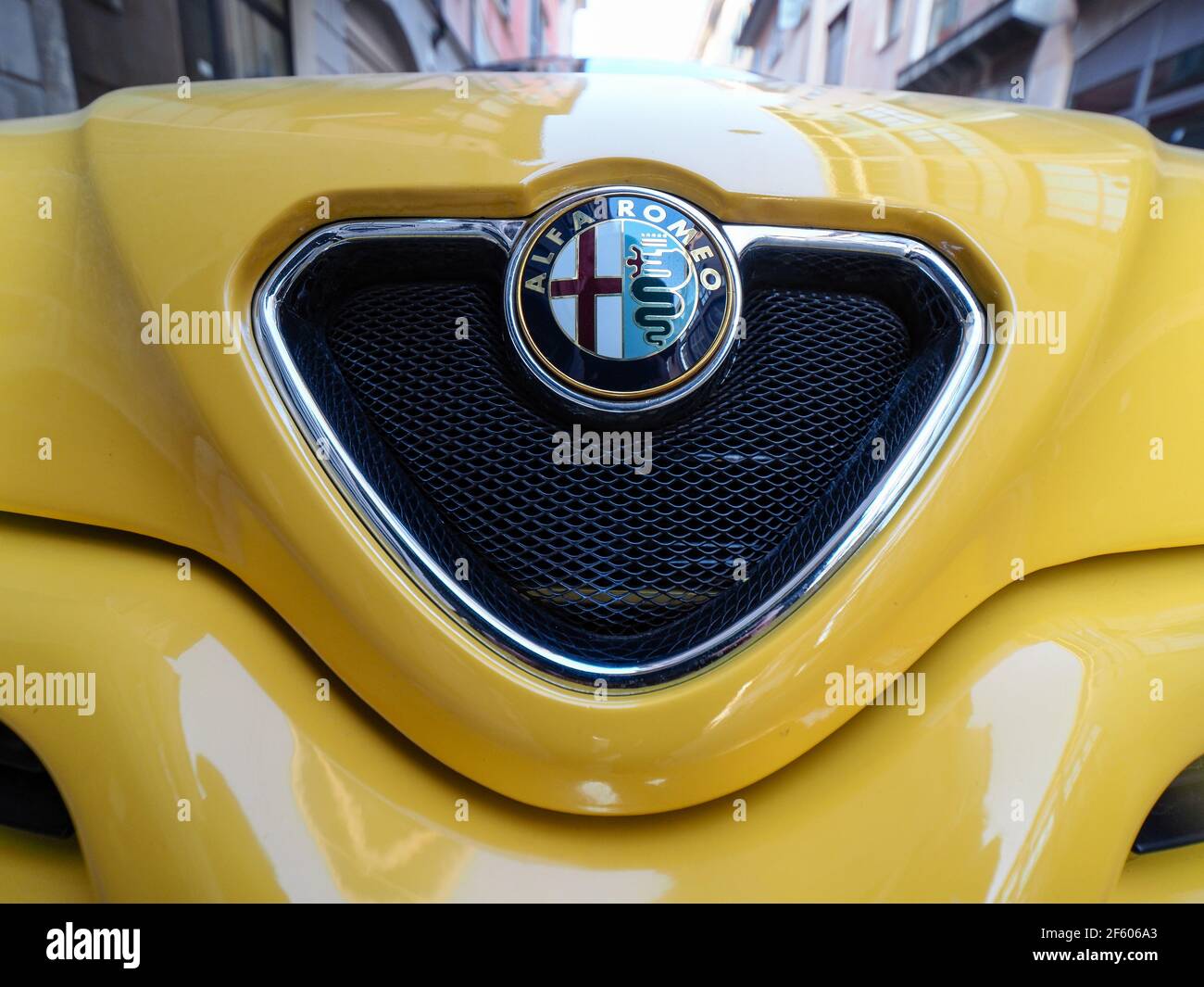 yellow Alfa Romeo Spider GTV cabriolet roadster Stock Photo - Alamy