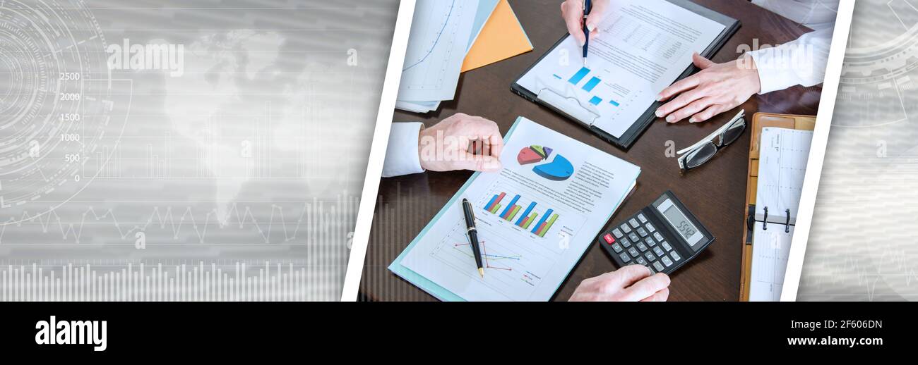 Two business people analyzing charts; panoramic banner Stock Photo - Alamy