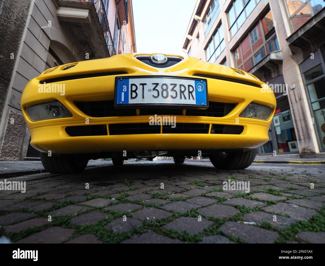 yellow Alfa Romeo Spider GTV cabriolet roadster Stock Photo - Alamy