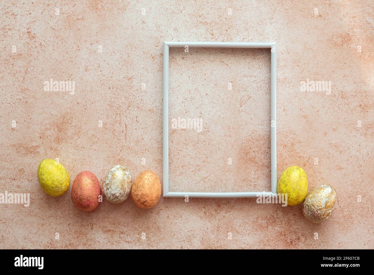 Happy easter background. Frame for text with easter eggs. Easter card with copy space for text. Stock Photo