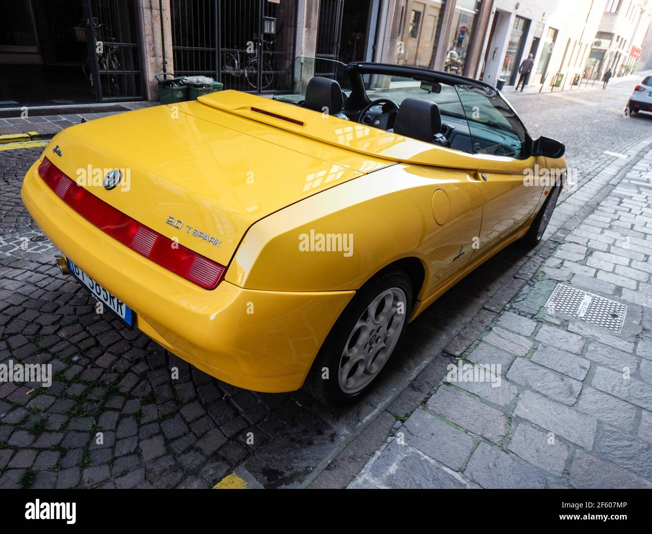 yellow Alfa Romeo Spider GTV cabriolet roadster Stock Photo - Alamy