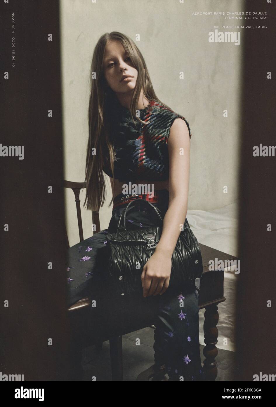 poster advertising Miu Miu fashion house with Mia Goth in paper