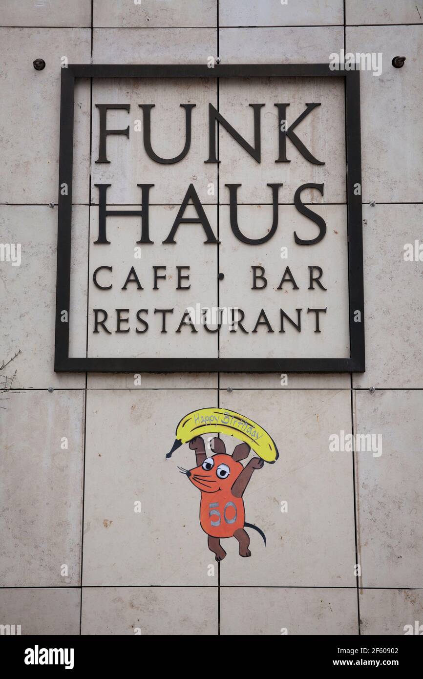 graffiti of the mouse celebrating the 50th anniversary of the TV program Die Sendung mit der Maus at Cafe Funkhaus am Wallrafplatz, Cologne, Germany. Stock Photo
