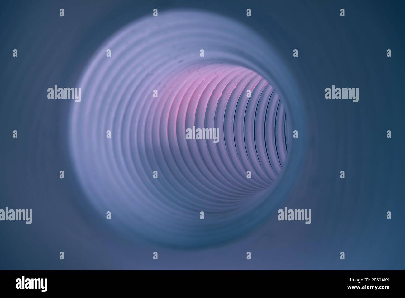 Beautiful round abstract tunnel with color light on a background ...