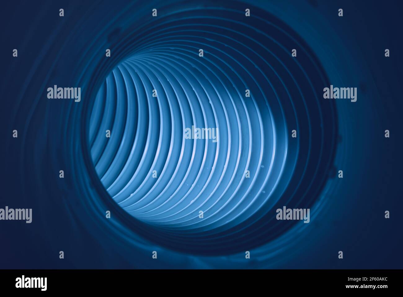 Beautiful round abstract blue tunnel with color light on a background ...