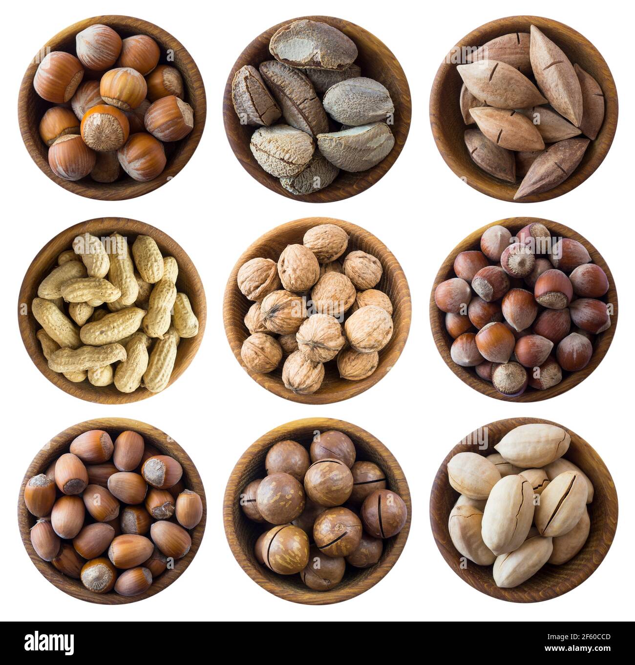 Set of nuts isolated on white background. Superfood with copy space for text. Brazil nut, peanuts, hazelnuts, macadamia, walnuts, pecans. Top view. Nu Stock Photo