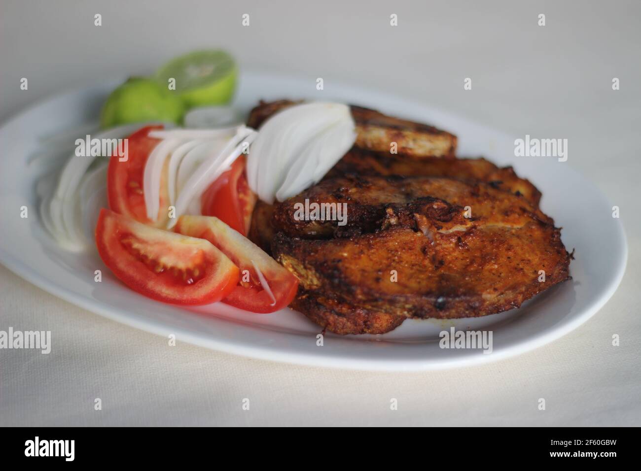 Air fried Cobia fish. In India it is called Moda fish. Other common names include black kingfish, black salmon, ling, lemonfish, crabeater, prodigal s Stock Photo