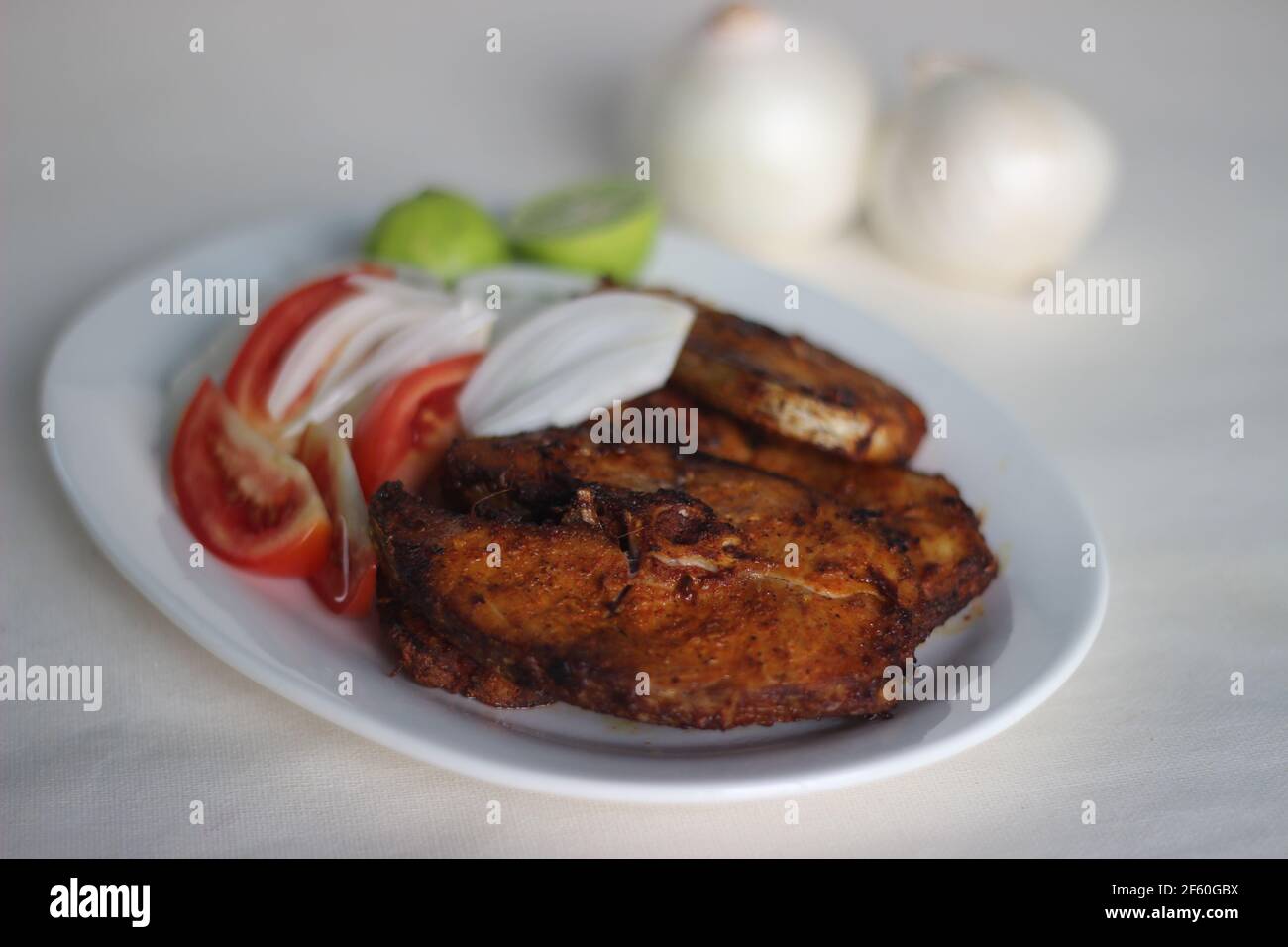 Air fried Cobia fish. In India it is called Moda fish. Other common names include black kingfish, black salmon, ling, lemonfish, crabeater, prodigal s Stock Photo