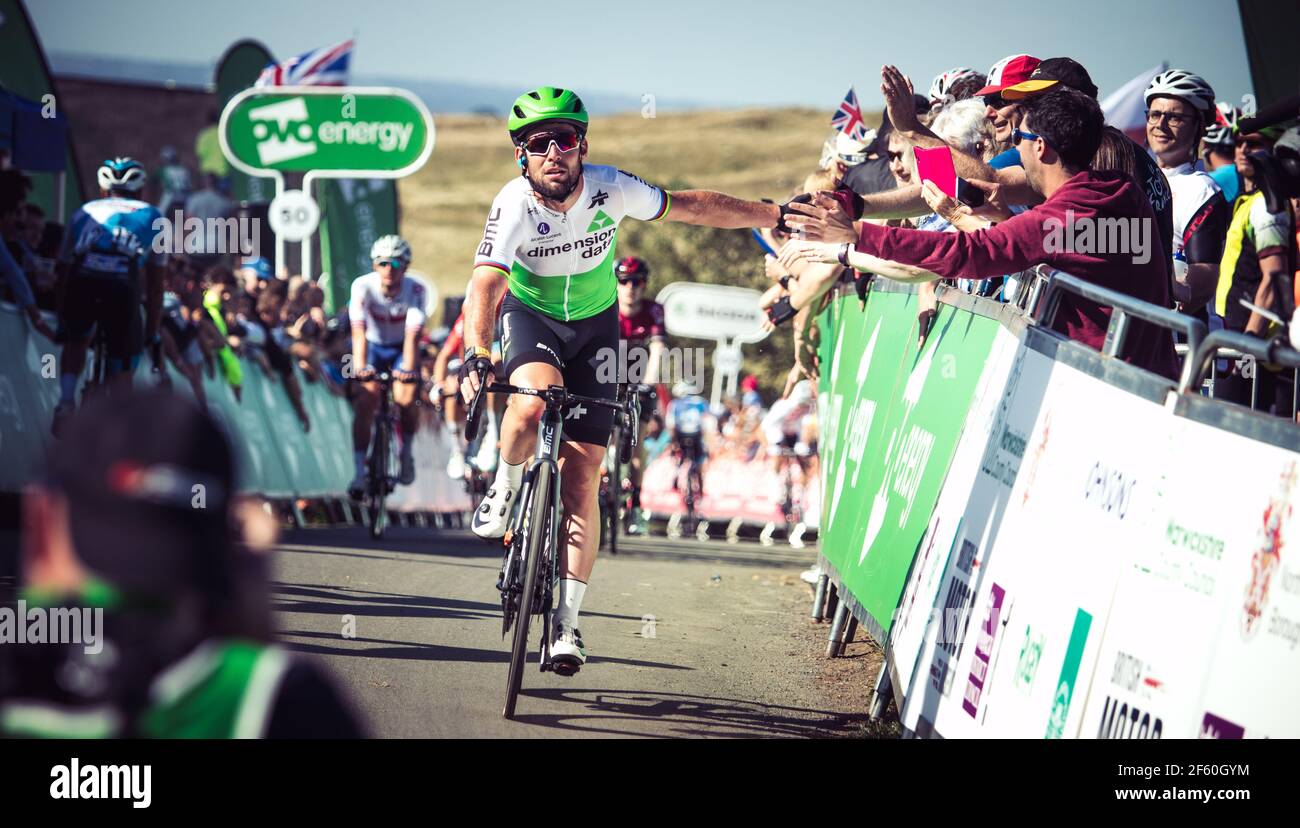 Mark Cavendish of Dimension Data, high 5s fans at the top of Burton Dassett at OVO Energy Tour of Britain 2019 stage 7 13/09/2019. Credit: Jon Wallace Stock Photo