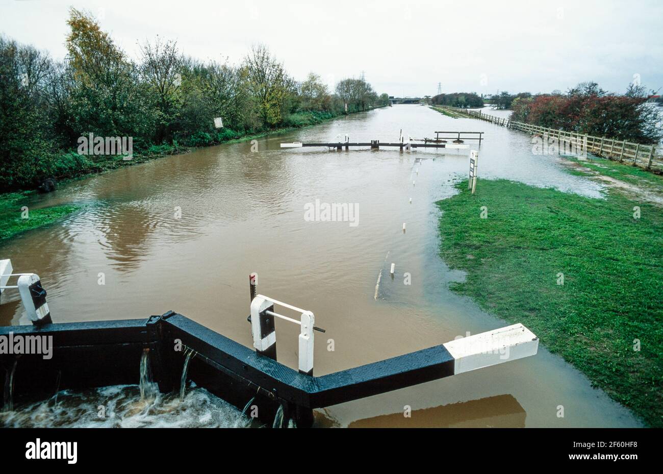 2000 Sawley - Flooding caused by prolonged rainfall in October and November 2000. Over the Harrington Bridge in Sawley, both Marshalls brick yard and the Plank and Leggit public house lost business as the road was closed due to severe flooding. The lock gates here on the River Trent at Sawley marina have been overwhelmed by the flood water. The B6540 Tamworth road was shut to traffic at this point.Sawley marina, Sawley, Derbyshire ,England, UK, GB,  Europe Stock Photo