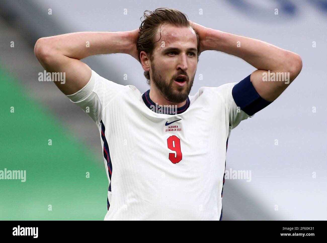 TIRANA, ALBANIA - MARCH 28: Harry Kane of Engalnd has his head in his hands during the FIFA World Cup 2022 Qatar qualifying match between Albania and England at the Qemal Stafa Stadium on March 28, 2021 in Tirana, Albania. Sporting stadiums around Europe remain under strict restrictions due to the Coronavirus Pandemic as Government social distancing laws prohibit fans inside venues resulting in games being played behind closed doors (Photo by MB Media) Stock Photo