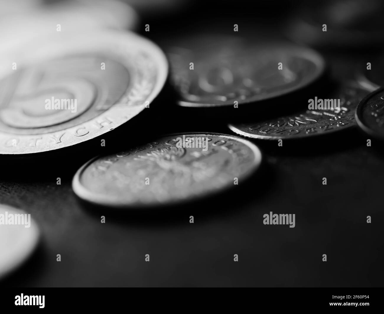Scattering of coins Black and White Stock Photos & Images - Alamy