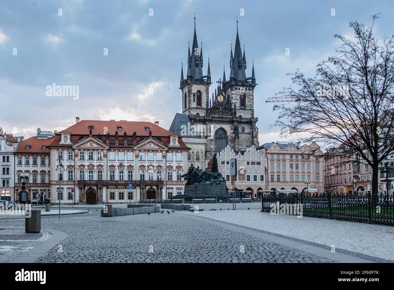 Old Town Square,Prague,Czech Republic. Empty city during lockdown.Historical, gothic style buildings at sunrise.Famous unesco heritage place. Church Stock Photo