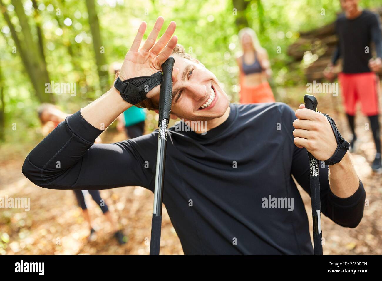 Sweating fitness trainer while Nordic walking for health and endurance  Stock Photo - Alamy