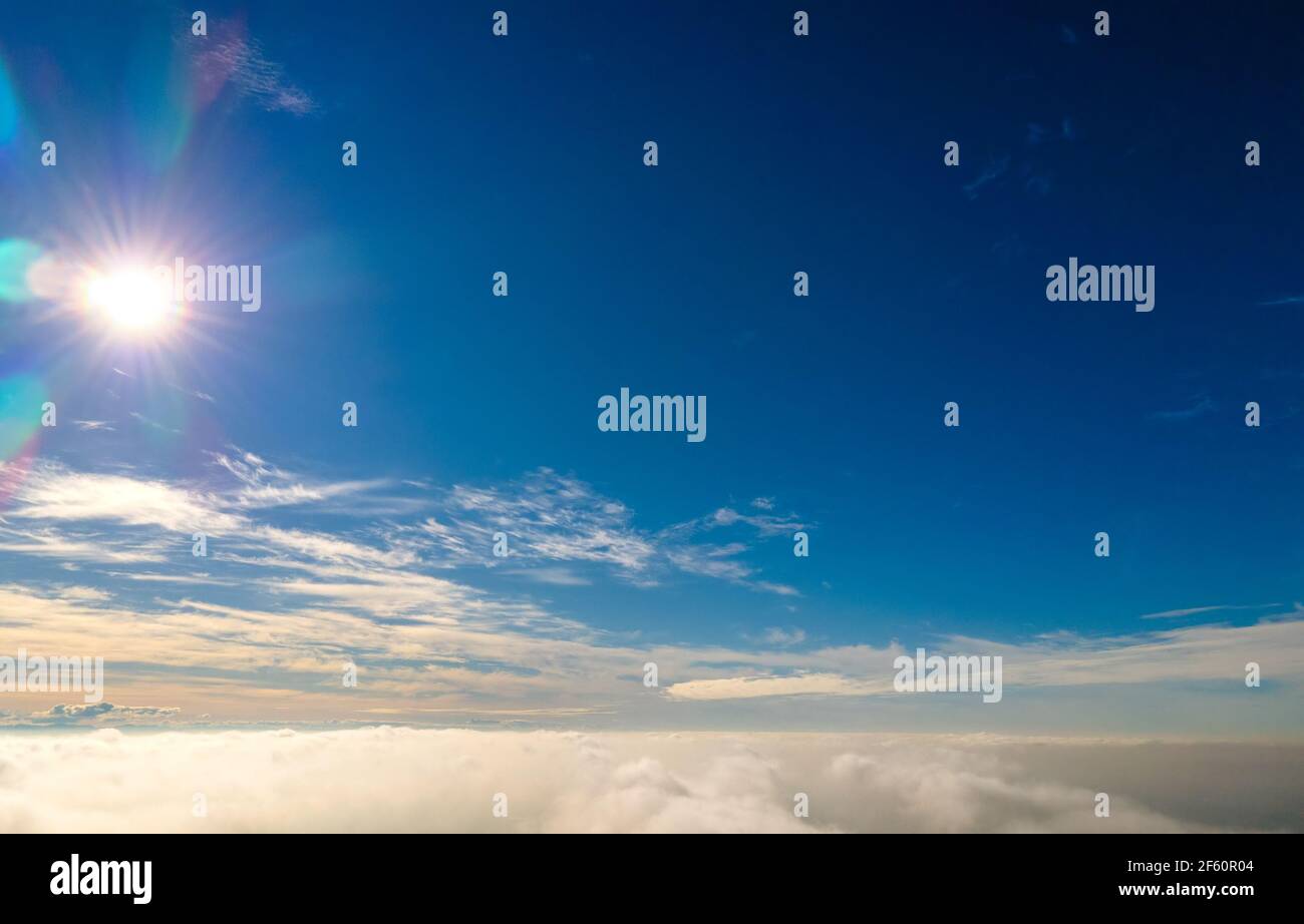 Aerial view from above of white puffy clouds in bright sunny day Stock ...