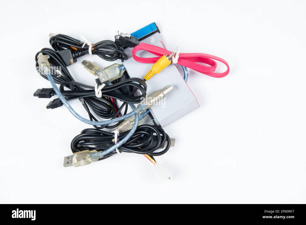 technological waste that remains in residence as computer cables Stock Photo