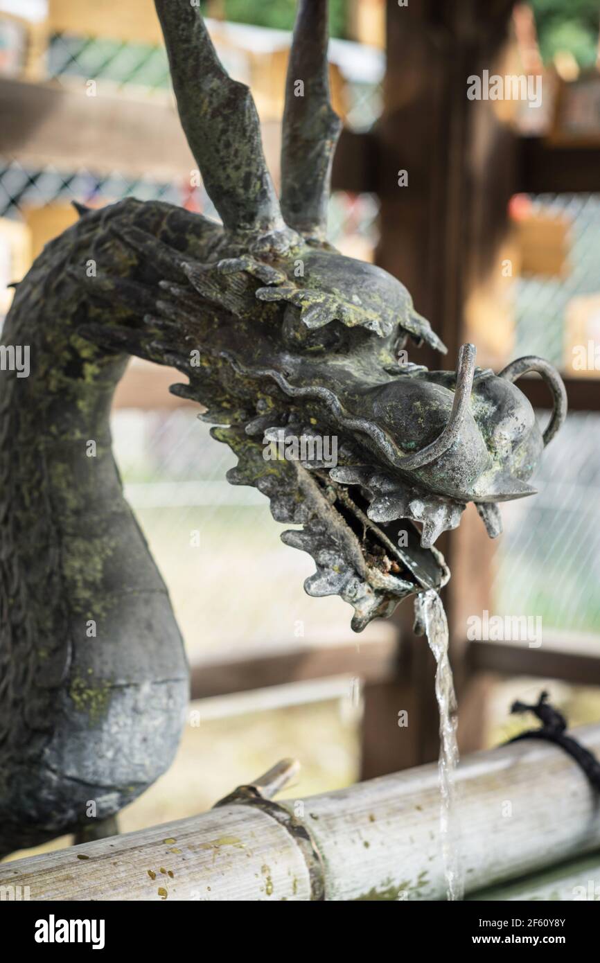 Japanese dragon purification fountain hires stock photography and