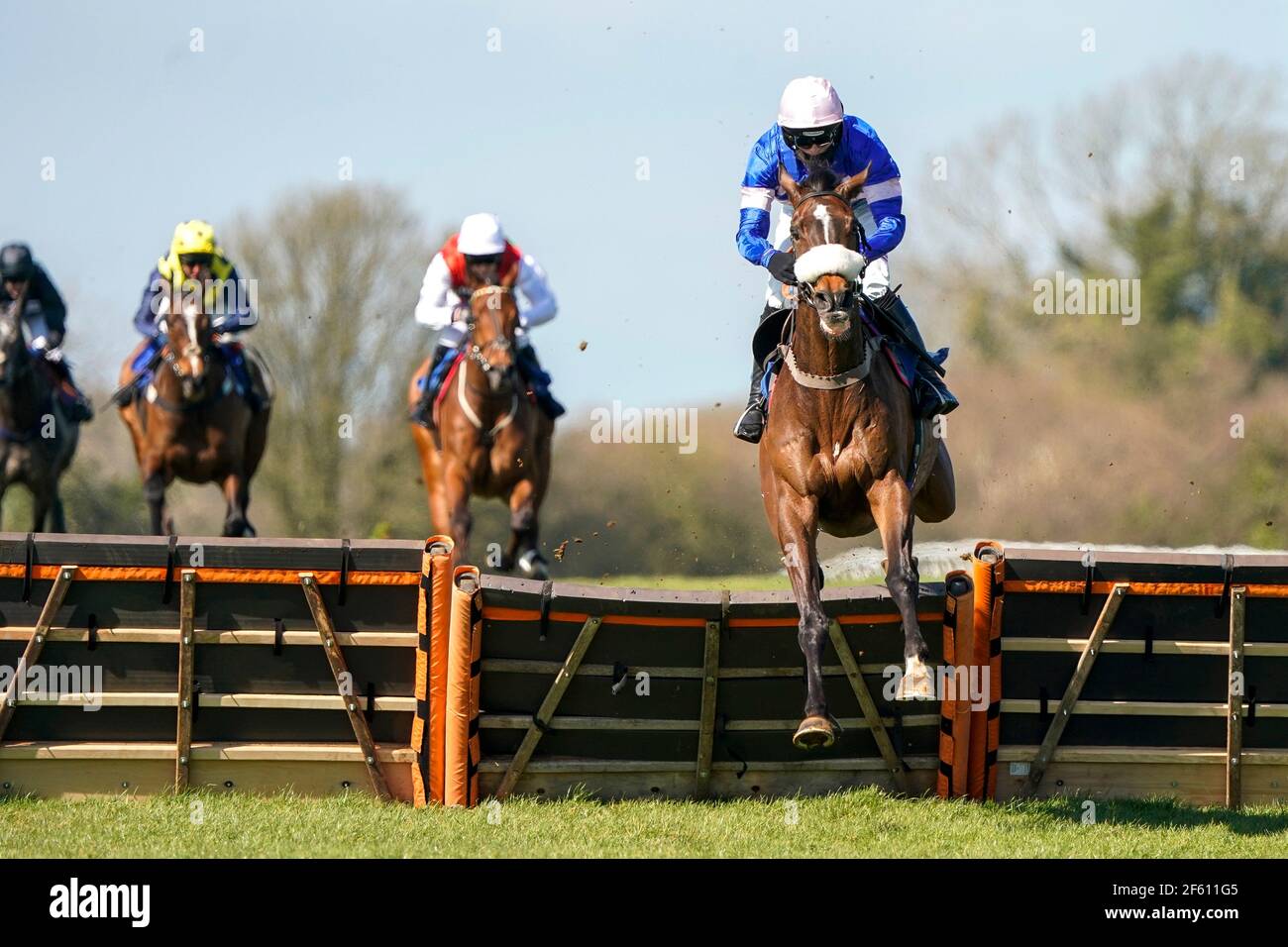 Harry Cobden riding Danny Kirwan (right) clears the last to win The Bet