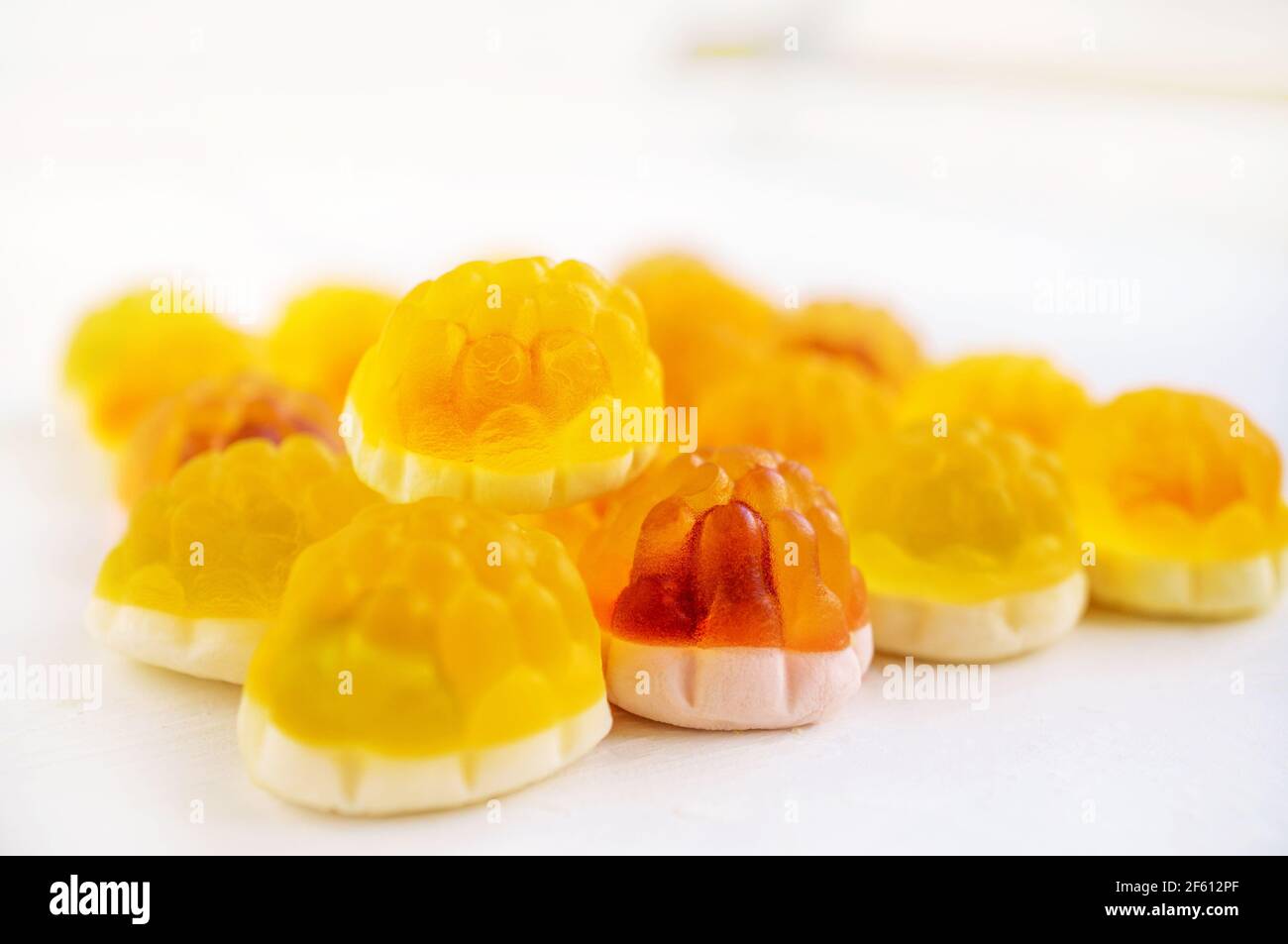 Macro photography of jellylike craft marmalade with orange juice. The