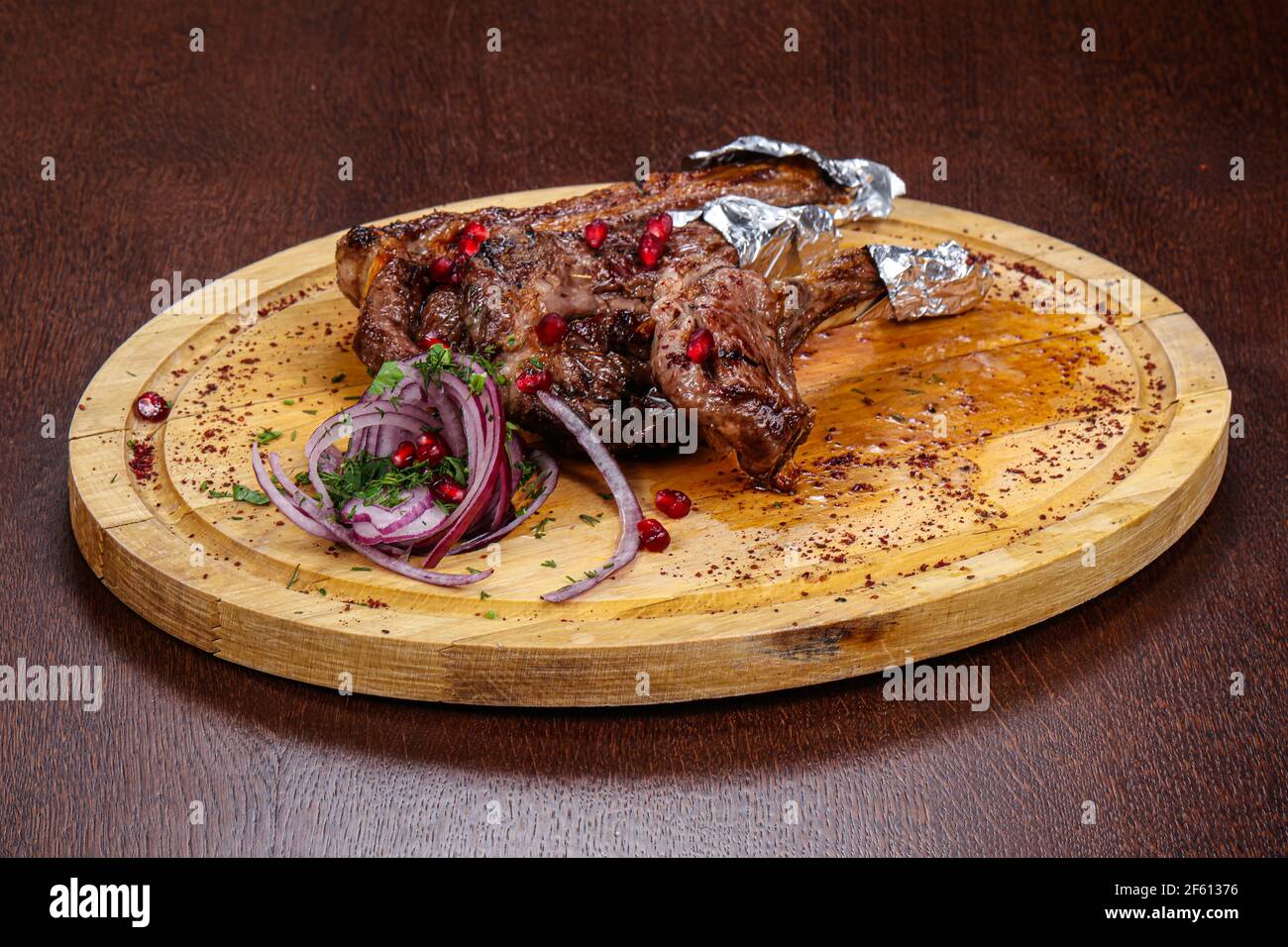 Delicous grilled lamb chop with bone served onion Stock Photo Alamy