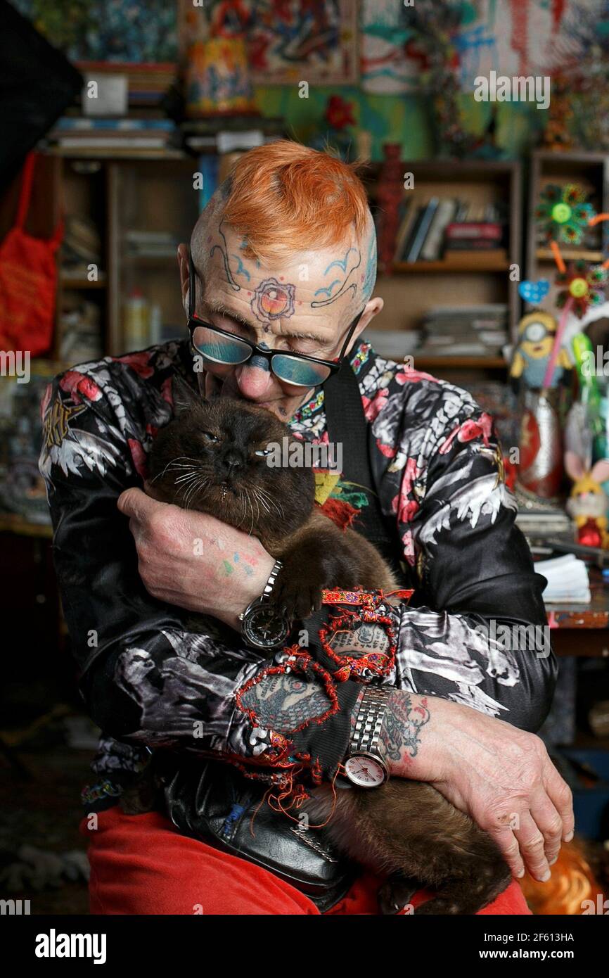 Pensioner Vladimir Sedakov Nicknamed Spartak Holds A Cat At Home In Yekaterinburg Russia March 28 21 The Active Lifestyle Of 74 Year Old Vladimir Sedakov Who Is On His Way To Cover Himself In