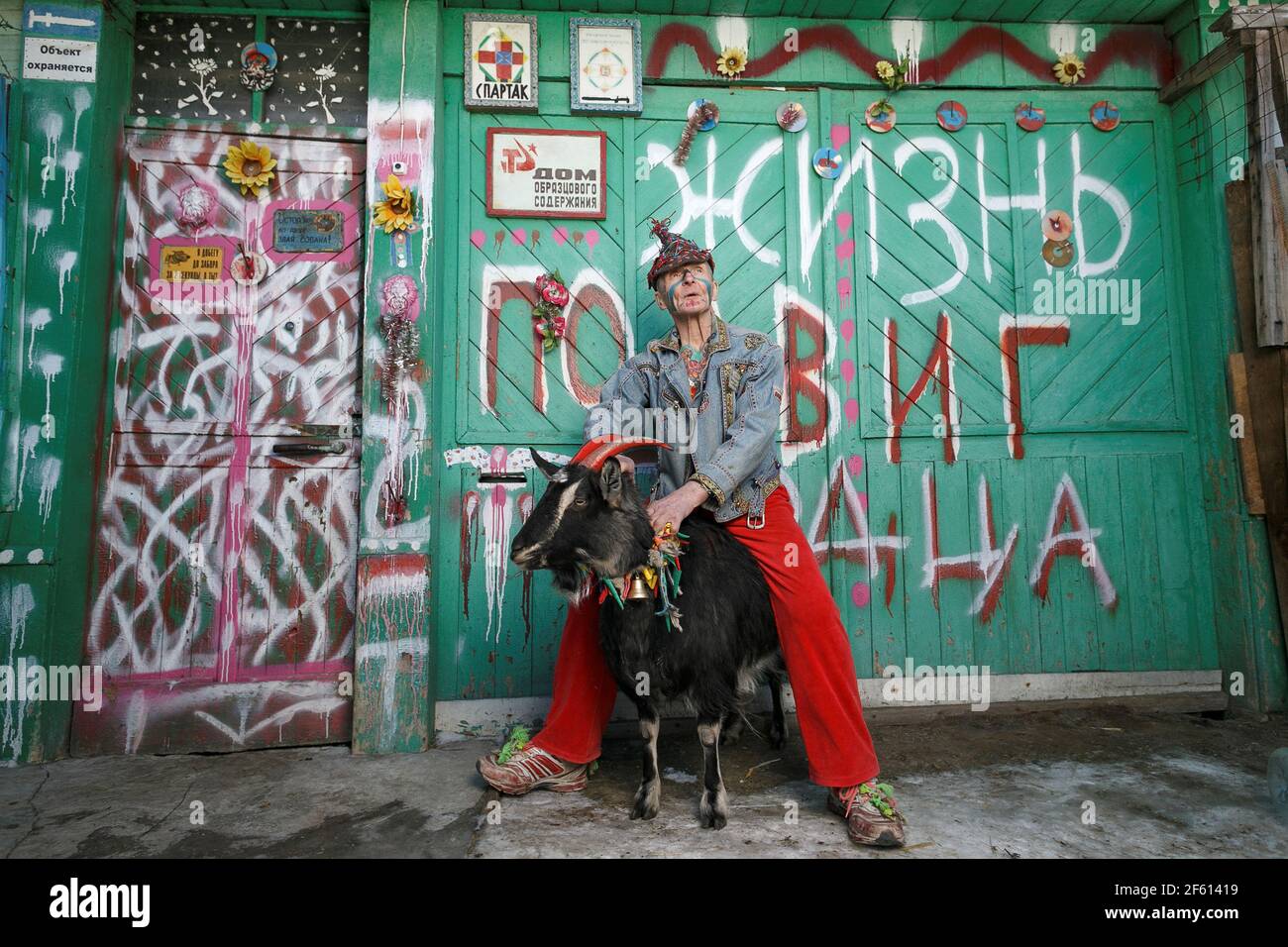 Pensioner Vladimir Sedakov Nicknamed Spartak Poses For A Picture While Sitting On His Goat In Yekaterinburg Russia March 28 21 The Active Lifestyle Of A 74 Year Old Vladimir Sedakov Who Is On His