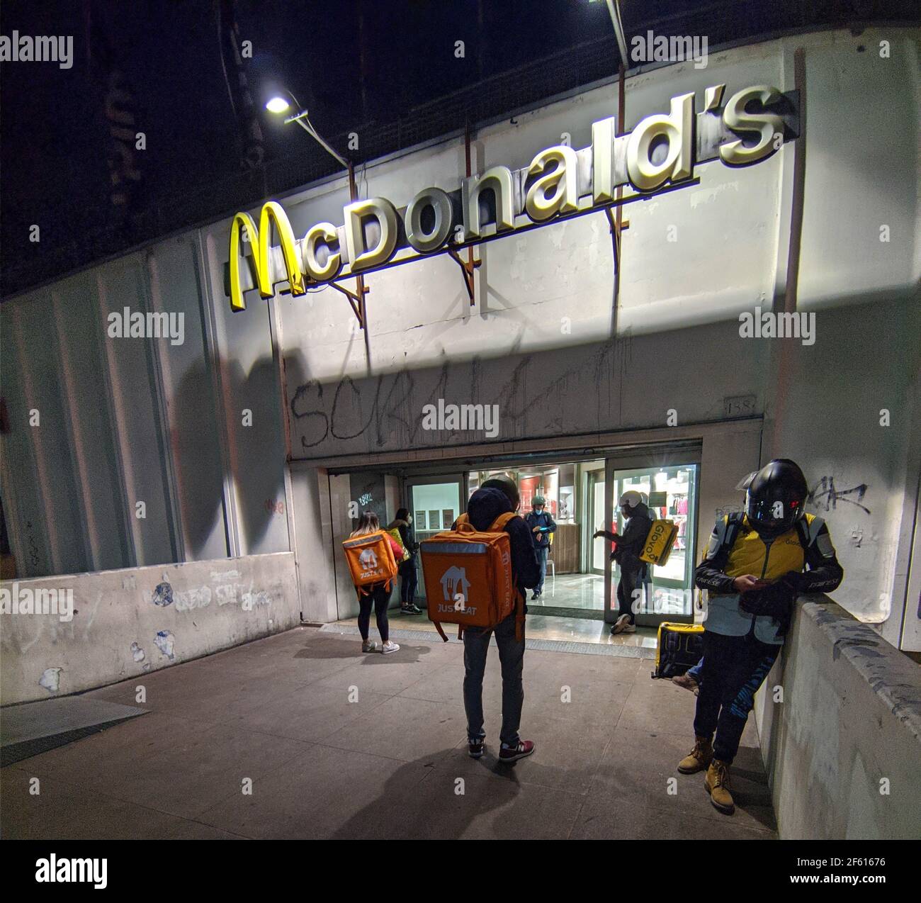 Italy, Rome, March 5, 2021 : Riders waiting in front of Mc Donald's prepare to make food deliveries at home   Photo © Lorenzo Fiorani/Sintesi/Alamy St Stock Photo