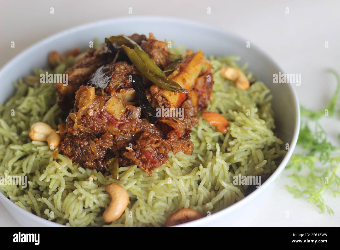 Homemade Coriander pulao, a one pot rice preparation in ghee with onions, green chutney and