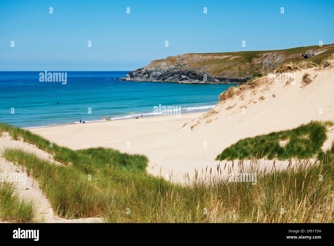 sunny summer day at holywell bay in cornwall england Stock Photo