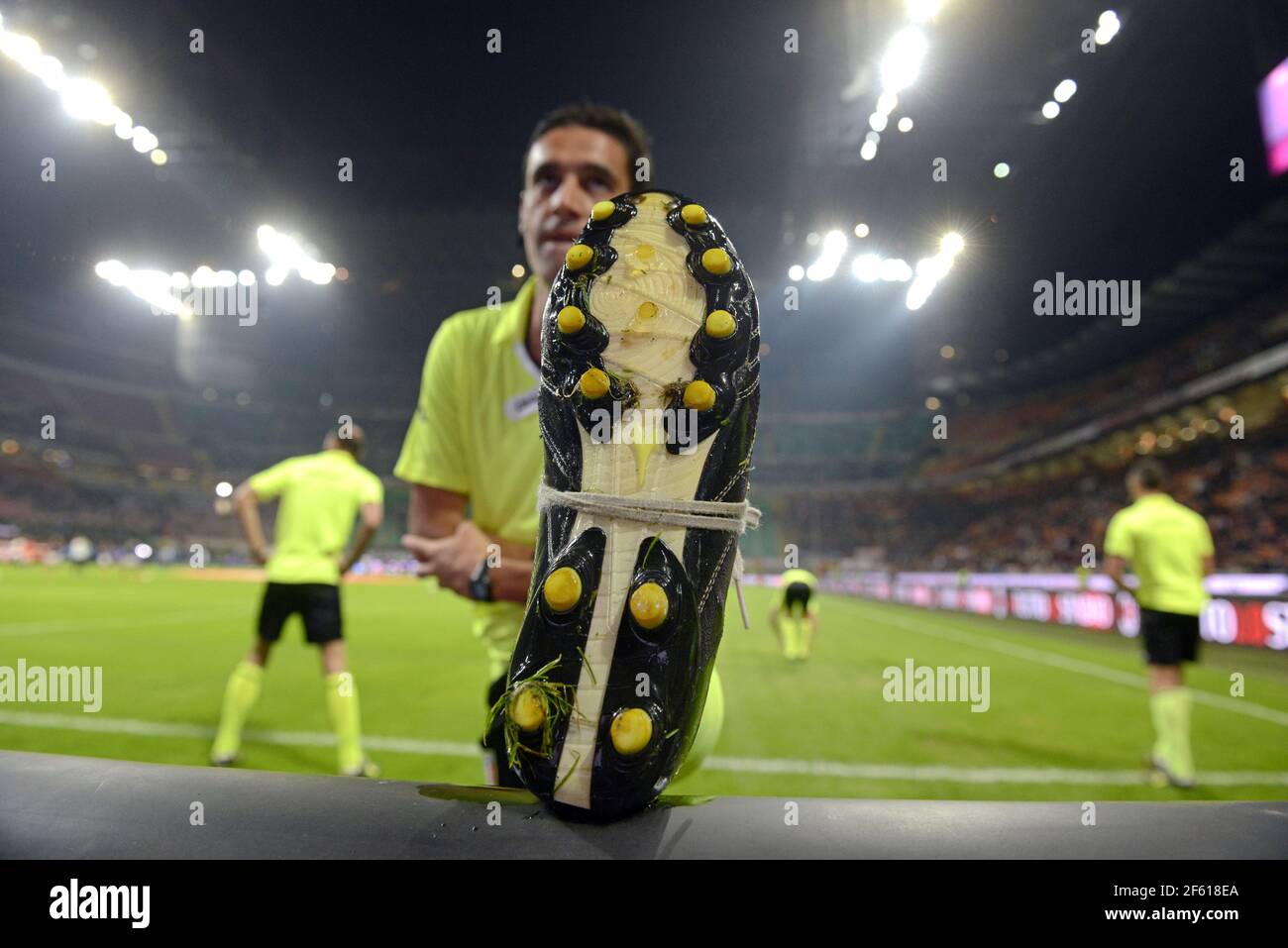 Football referee warm up before the italian  Serie A football match at the San Siro stadium, in Milan. Stock Photo