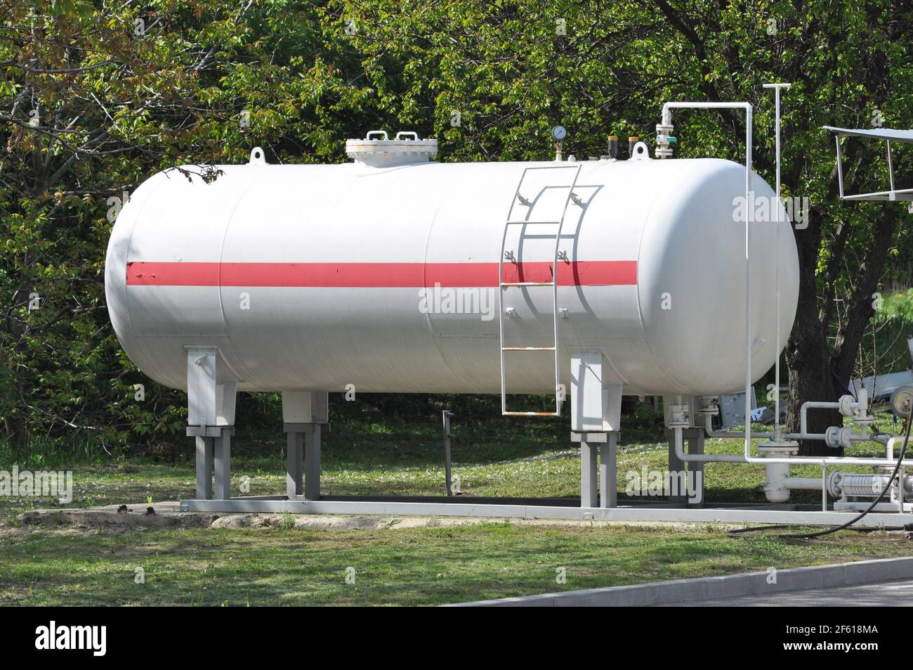 Propane gas station. Station for filling liquefied gas into the vehicle tanks. Environmentally friendly fuel. Gas station fuel tank. Stock Photo
