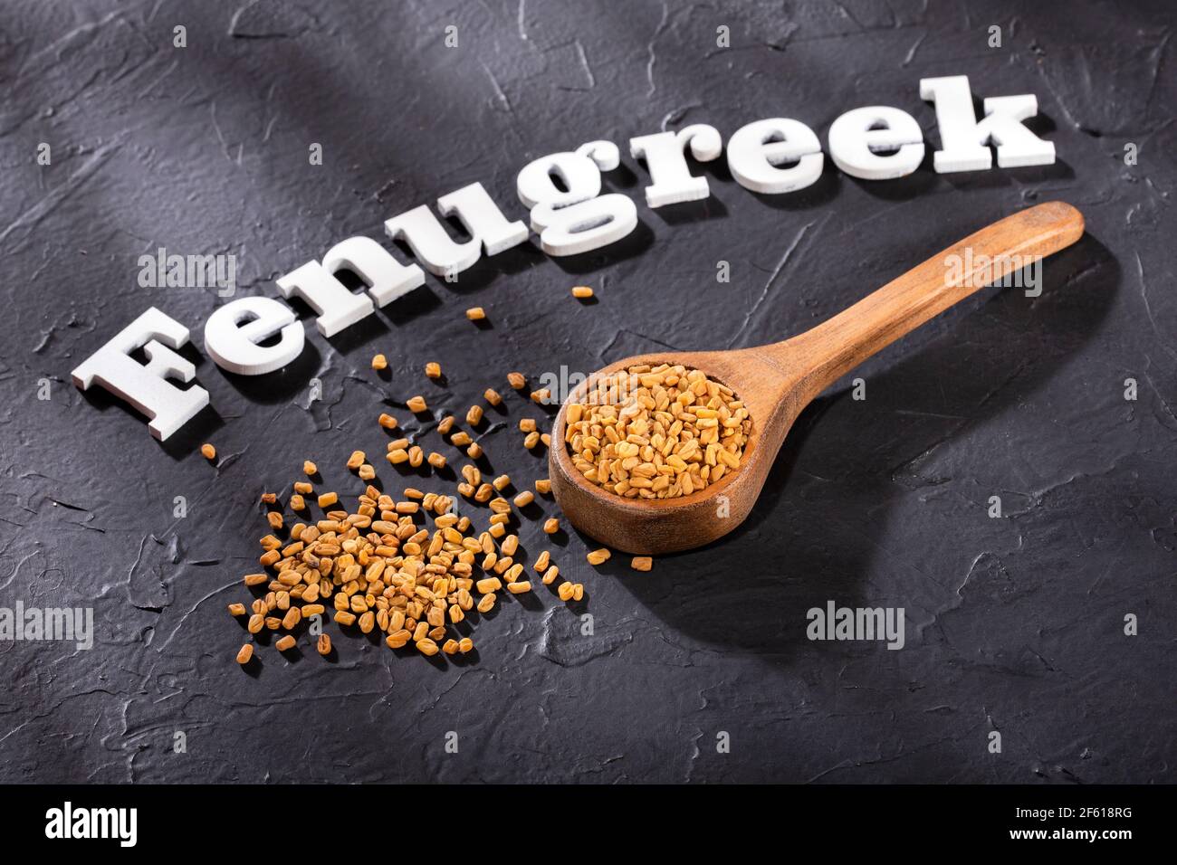 Fenugreek yellow seeds - Trigonella foenum-graecum. Stock Photo