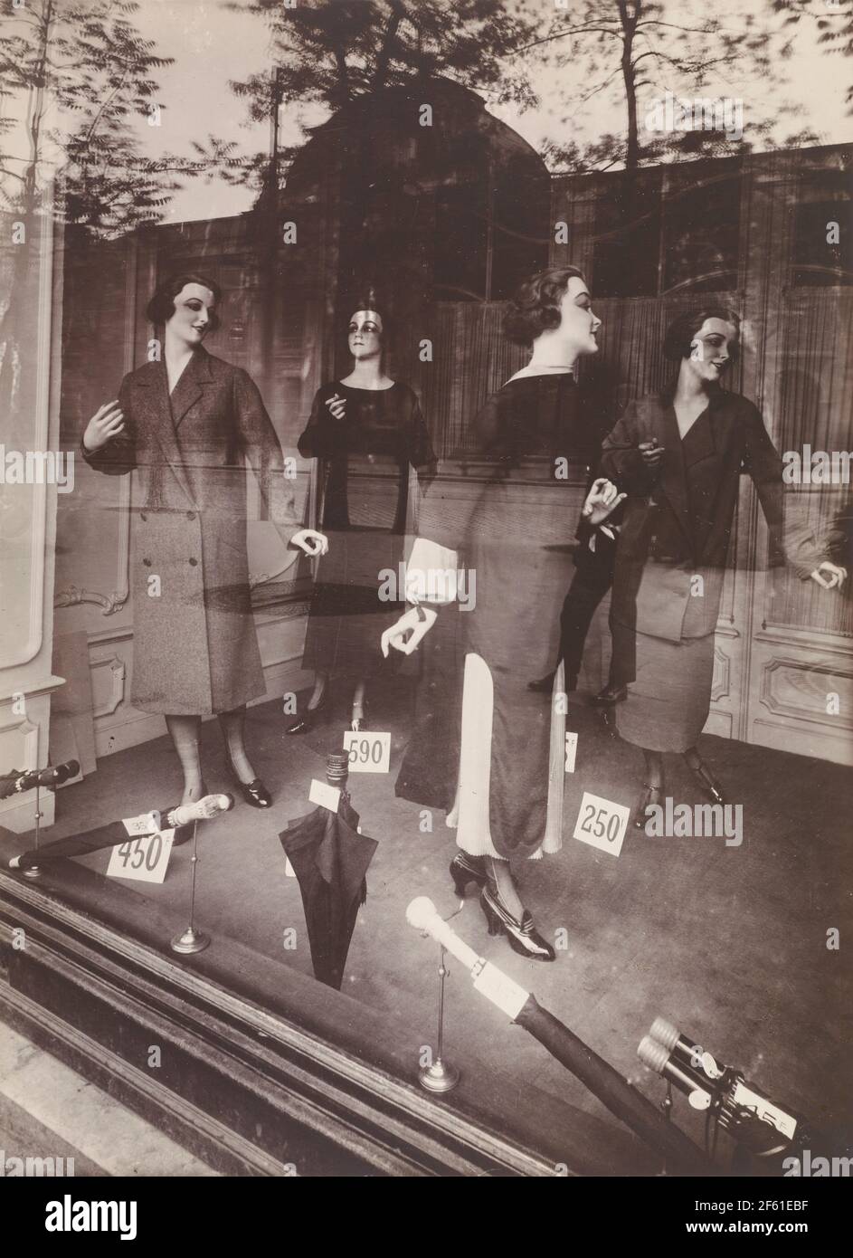 Shop window, Avenue des Gobelins, Paris, France, circa 1925 by Eurgene Atget.   Eugène Atget, full name Jean-Eugène-Auguste Atget, 1857 - 1927.  French photographer, famed for his decades long work to document the architecture and aura of Paris before all was lost to modernisation. Stock Photo