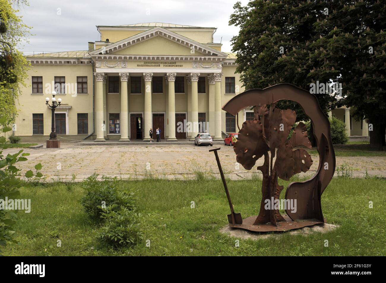 Steel sculpture, with University of Dnipro beyond, Ukraine. Stock Photo