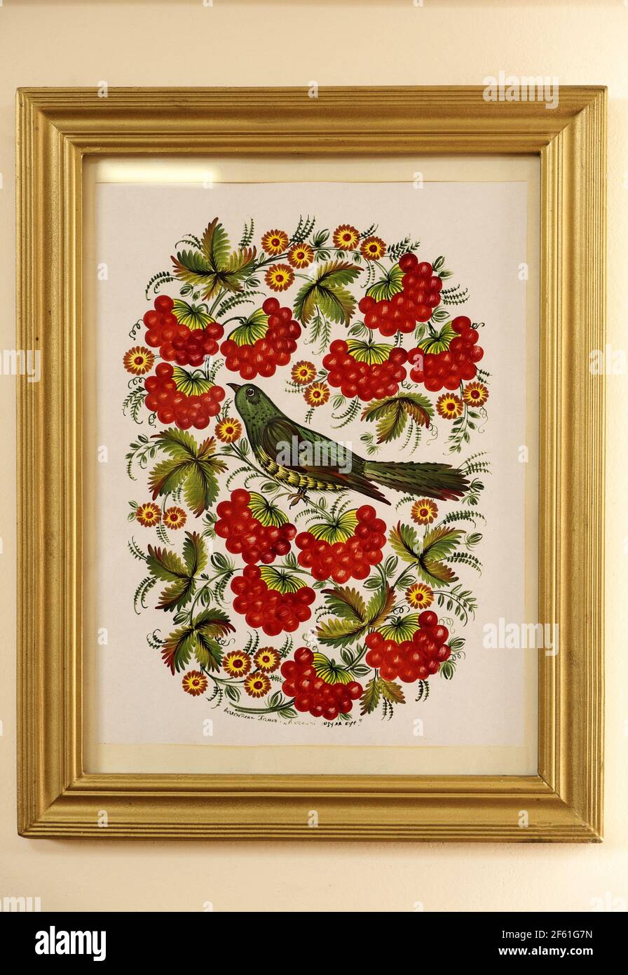 Traditional picture of bird and berries, Petrykivka Folk Art Center, Petrykivka, Ukraine. Stock Photo
